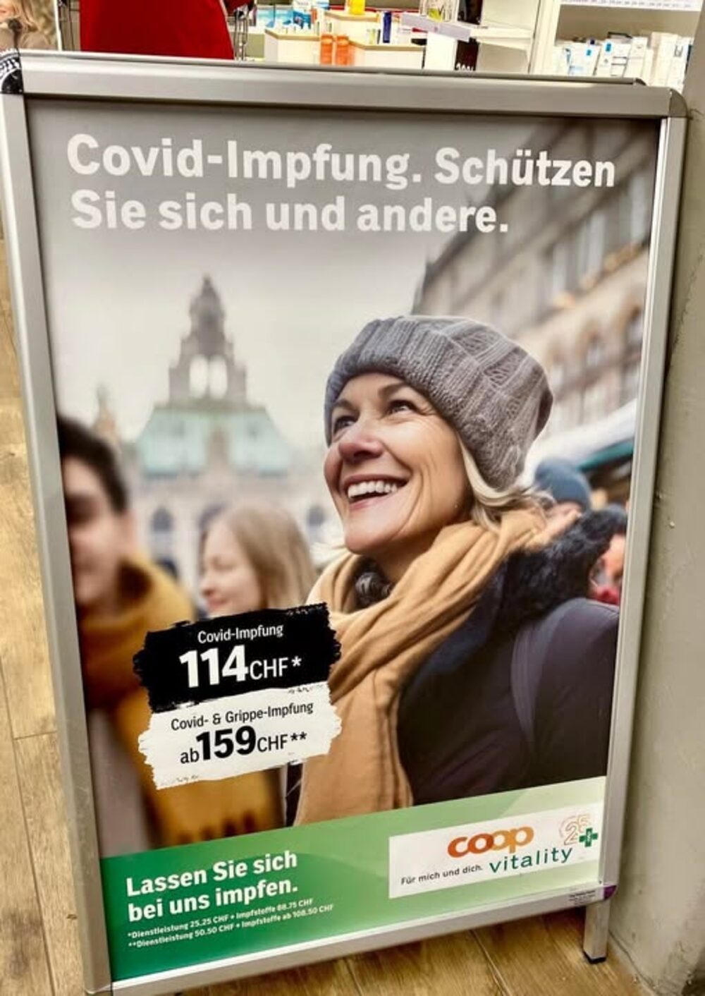 Covid-Impfung-Werbeplakat von Coop Vitality